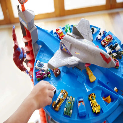 Hot Wheels Track Set with 4 1:64 Scale Toy Cars, Super Ultimate Garage, Over 3 Feet Tall